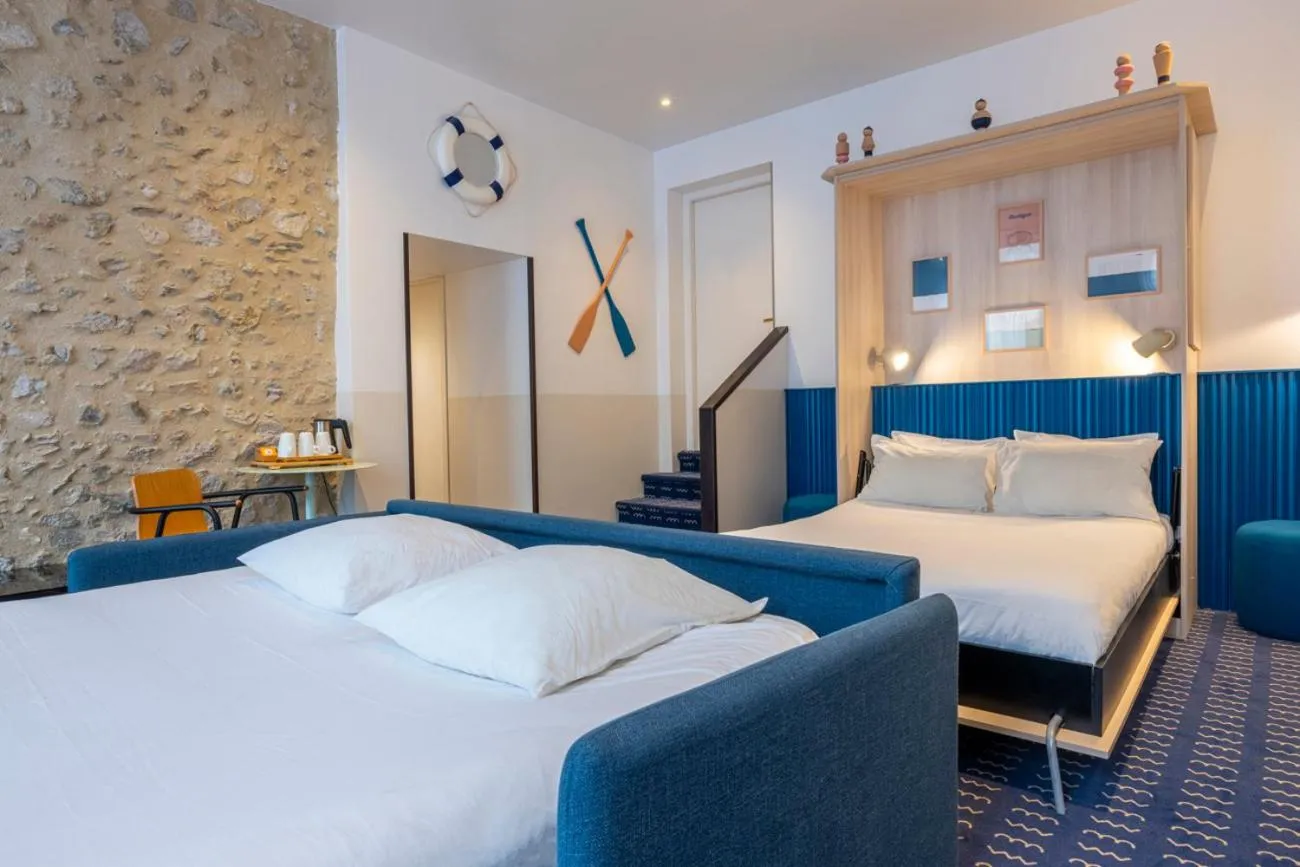 Bed in Hôtel du Palais de l'Isle