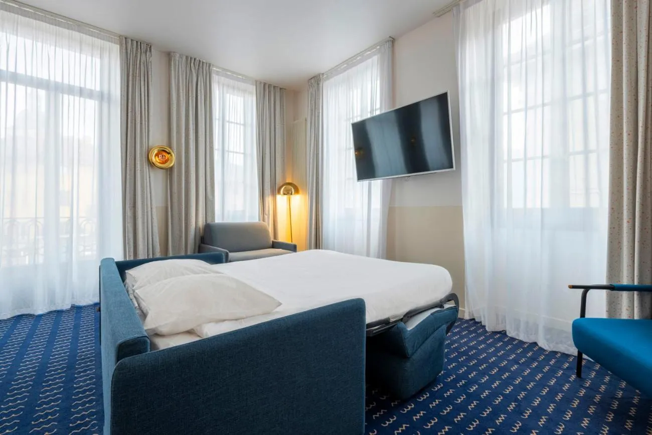 Bed in Hôtel du Palais de l'Isle