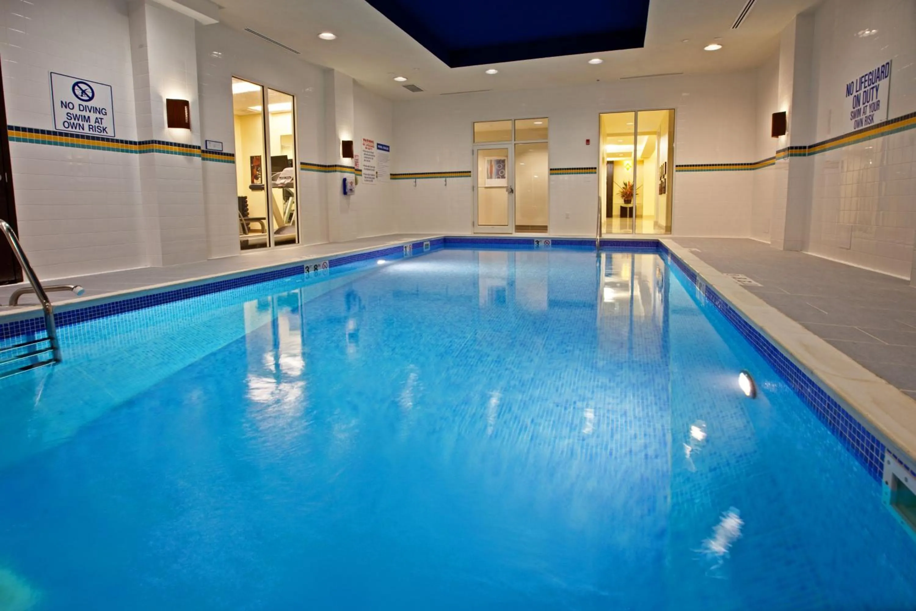 Swimming pool in Holiday Inn Louisville Airport - Fair/Expo by IHG