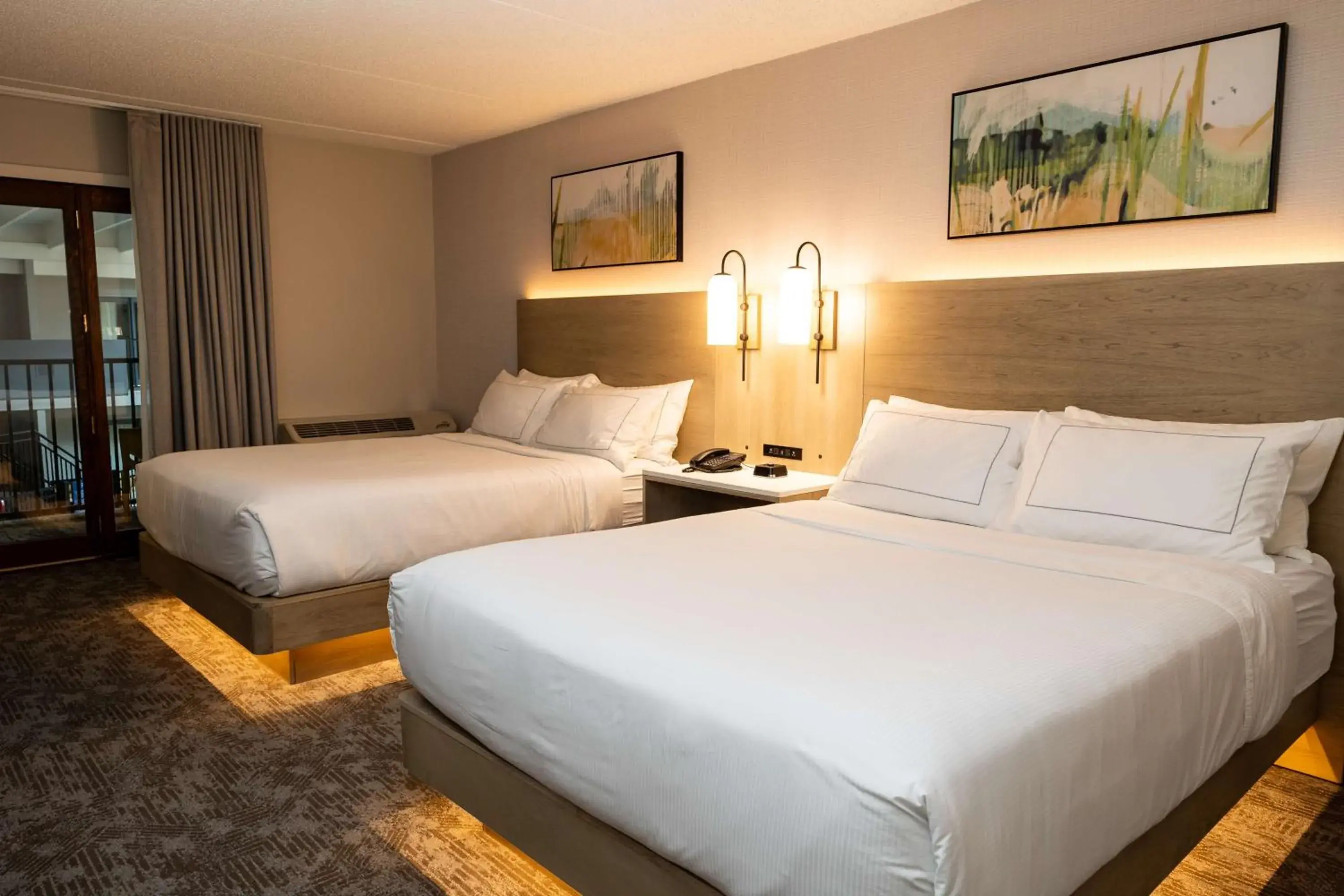 Queen Room with Two Queen Beds and Pool View in Holiday Inn Austin Conference Center, an IHG Hotel Queen Room with Two Queen Beds and Pool View in Holiday Inn Austin Conference Center, an IHG Hotel