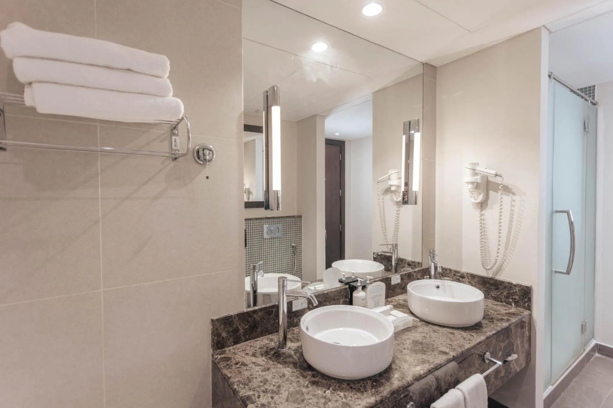 Bathroom in Holiday Inn Abu Dhabi by IHG