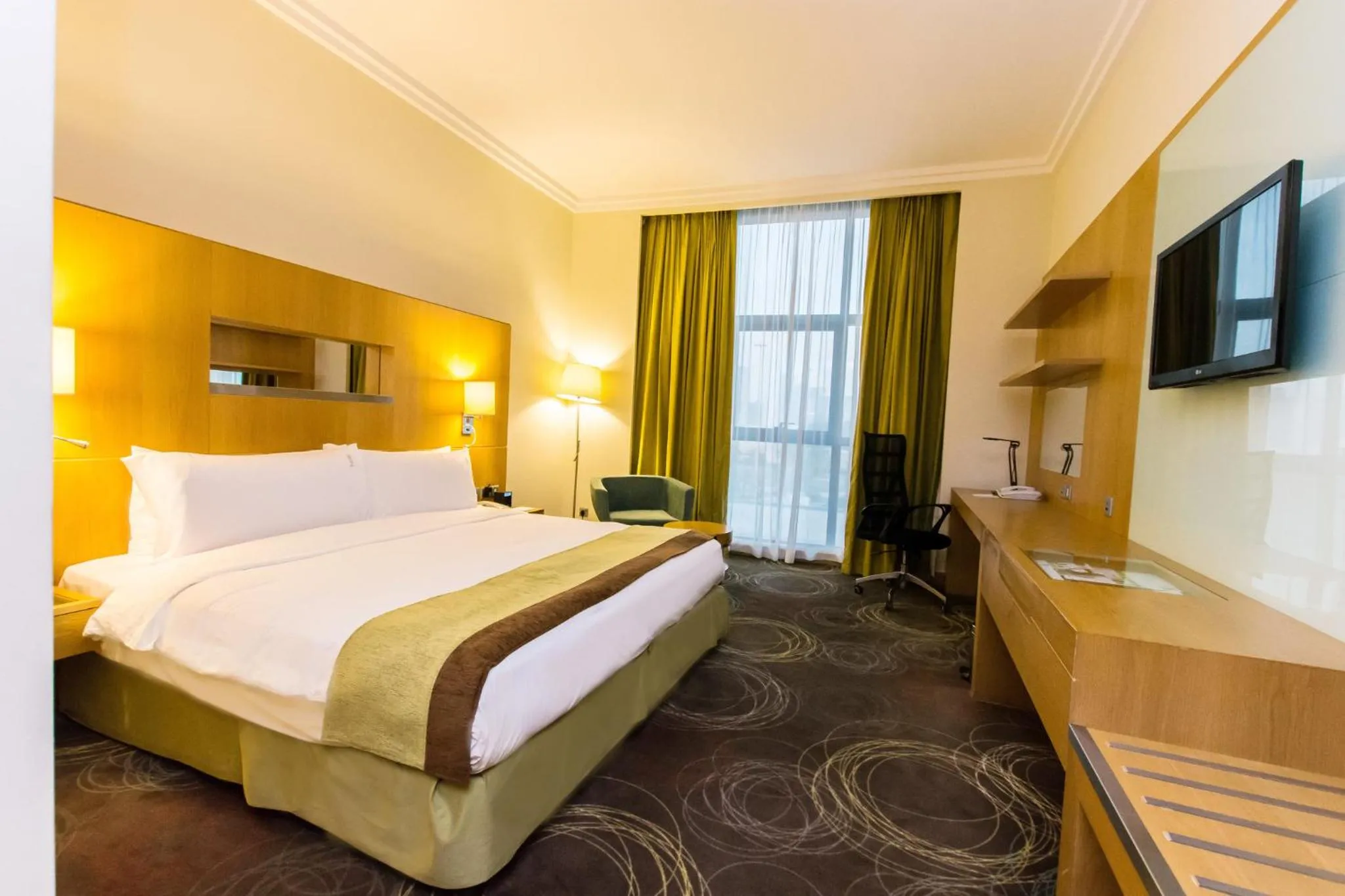 Photo of the whole room, Bed in Holiday Inn Abu Dhabi by IHG