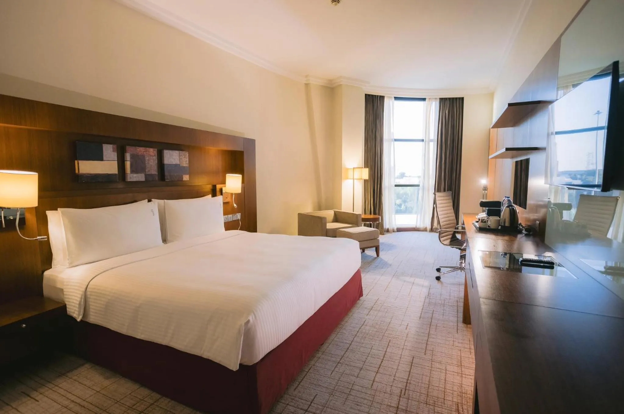 Photo of the whole room, Bed in Holiday Inn Abu Dhabi by IHG