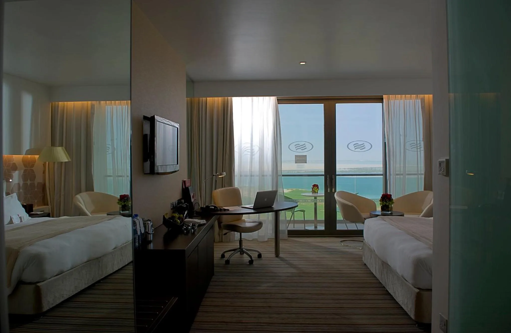 Photo of the whole room, Bed in Crowne Plaza Yas Island by IHG
