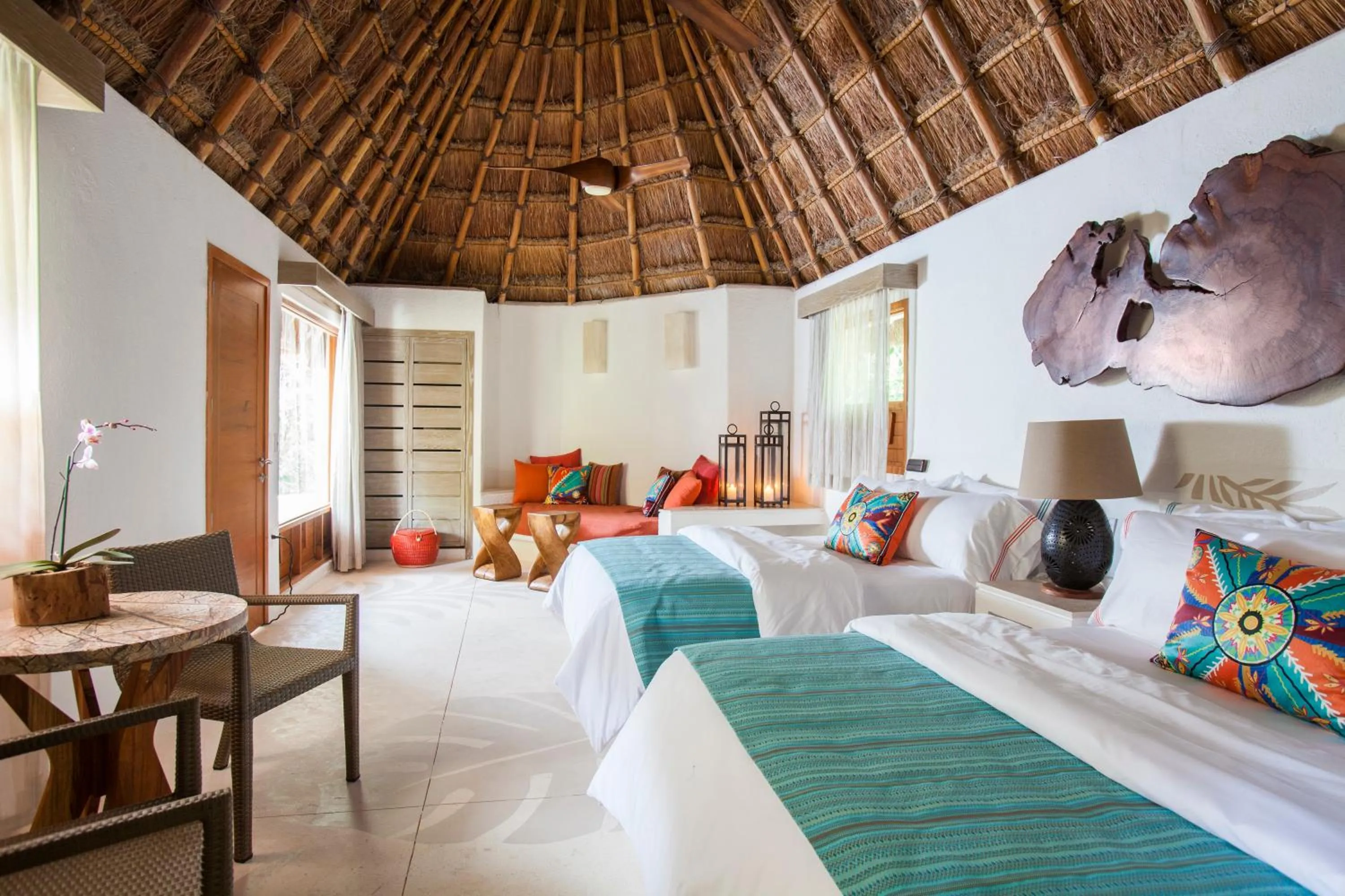 Bed in Mahekal Beach Front Resort & Spa