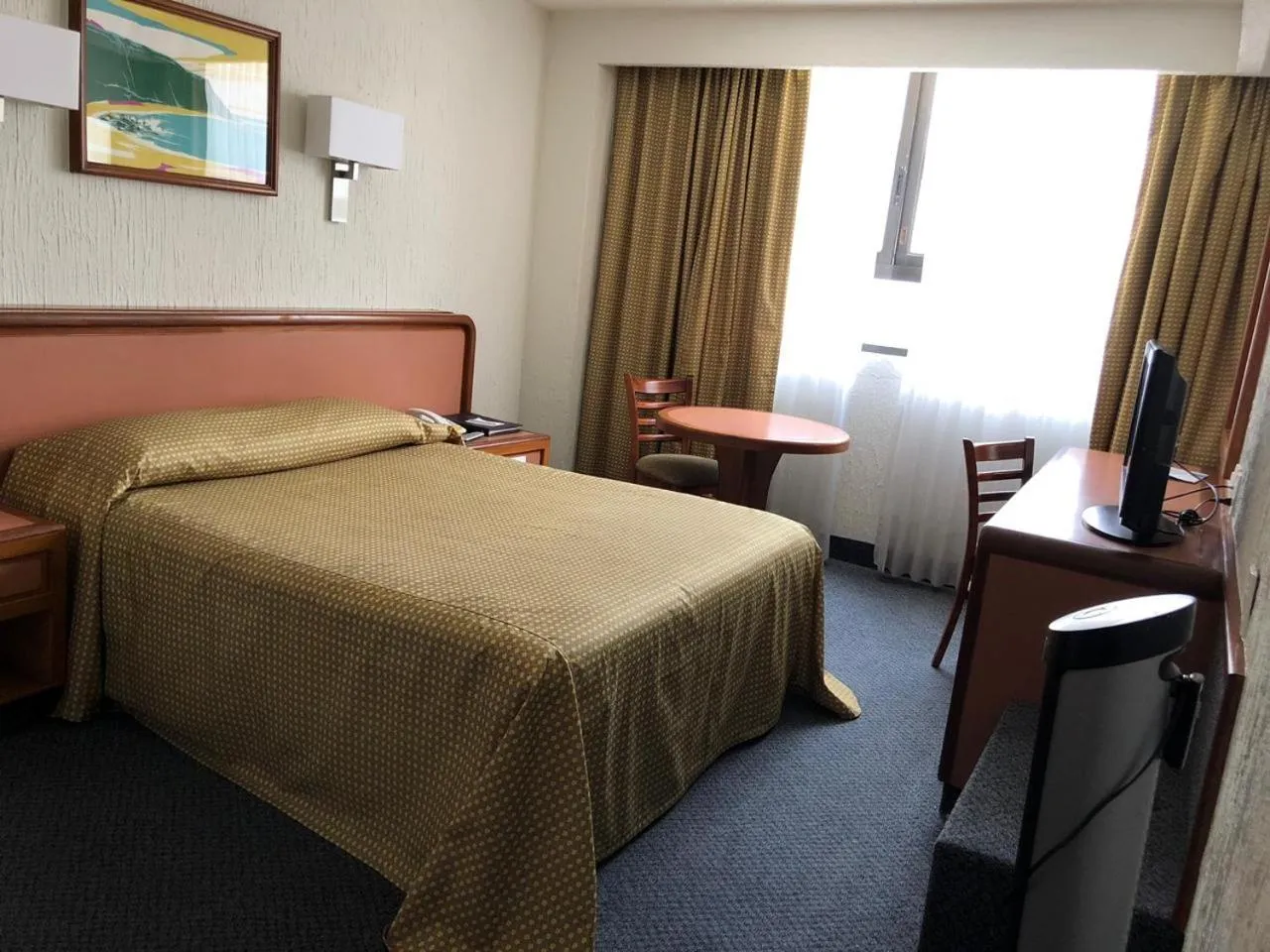 Bed in Hotel Metropol