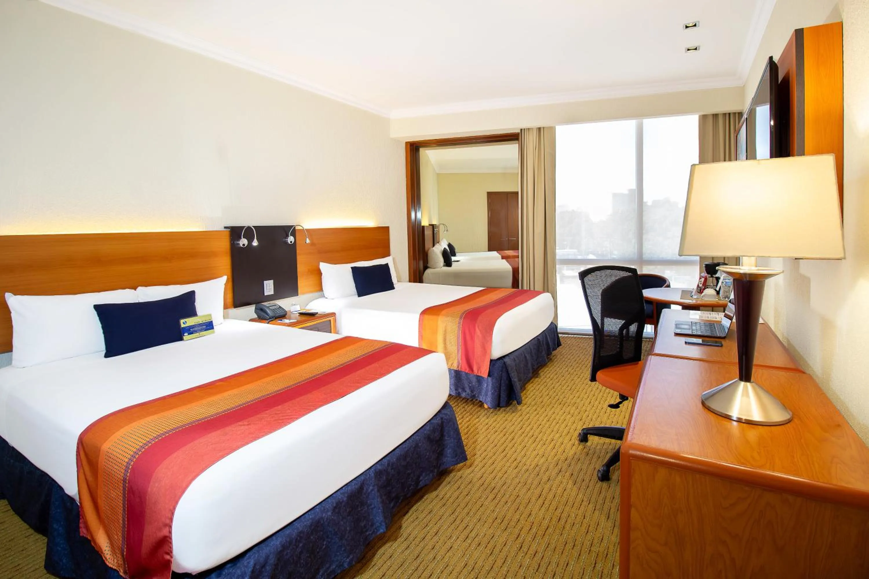 Photo of the whole room, Bed in Hotel Guadalajara Plaza Expo