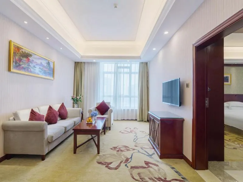 Bed in Vienna Hotel Guilin North High-Speed Railway Station Chengbei