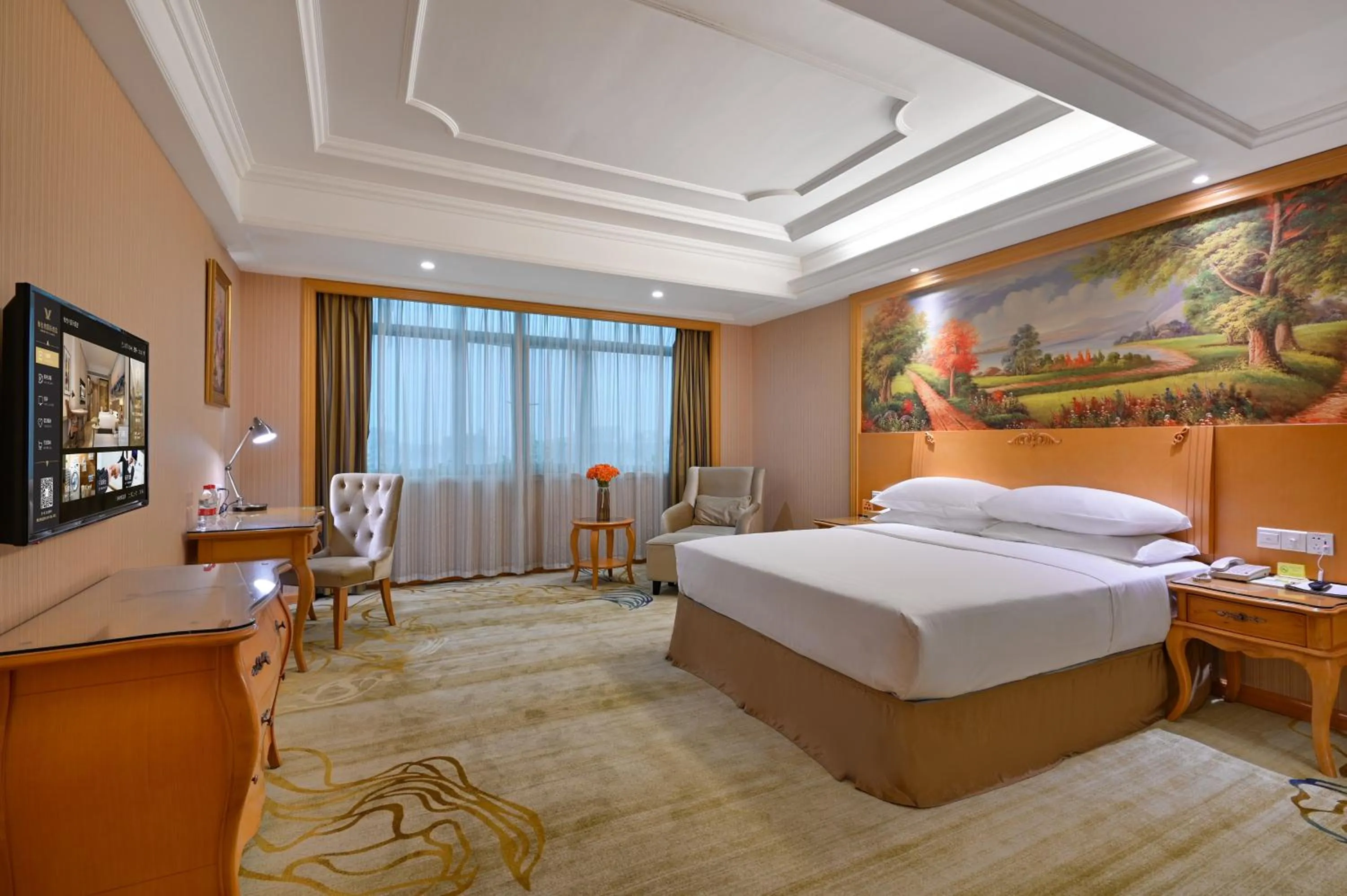 Bed in Vienna International Hotel Guangzhou Baiyun International Conference Center