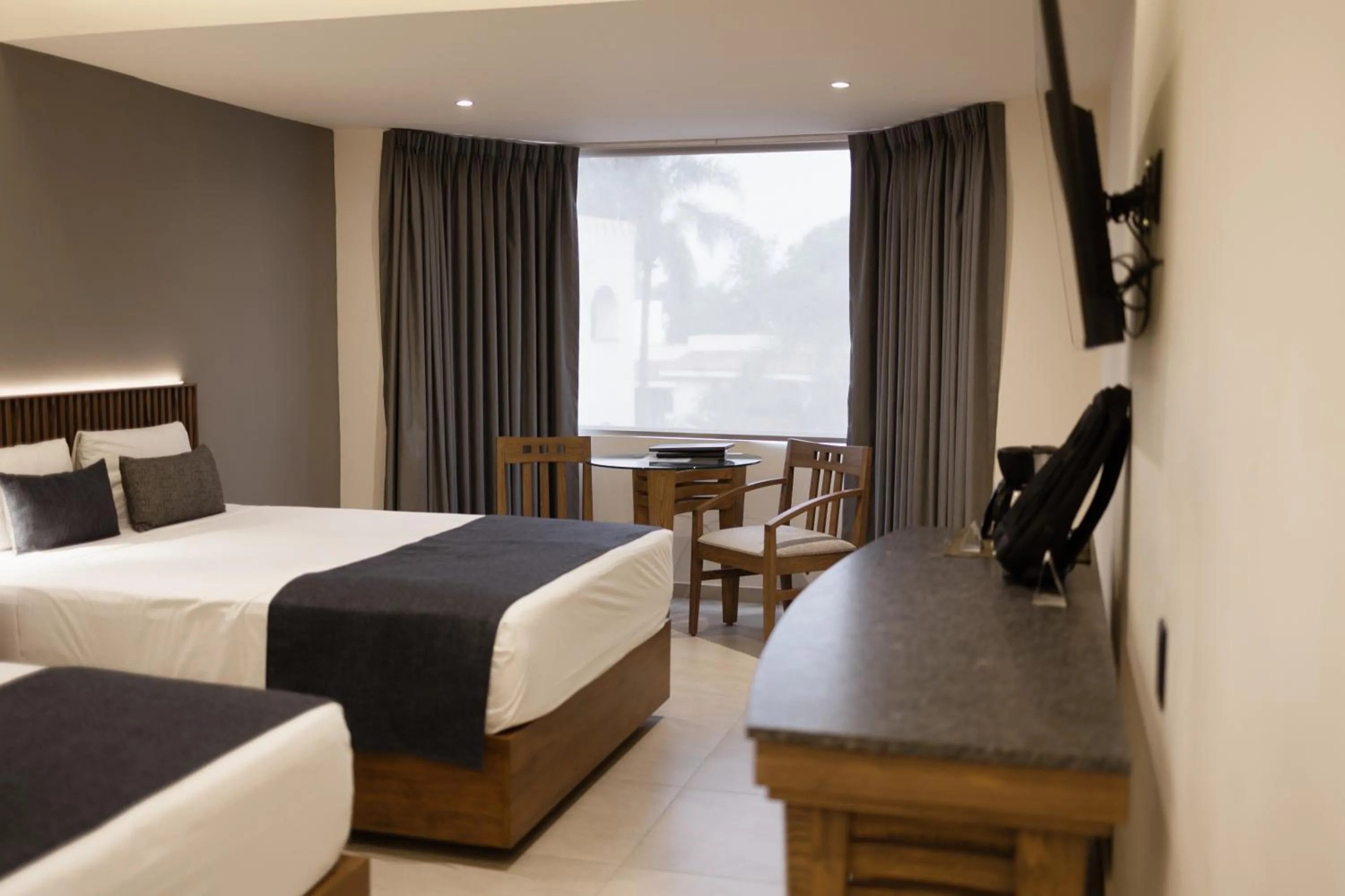 Bed in Hotel Guadalajara Plaza Ejecutivo