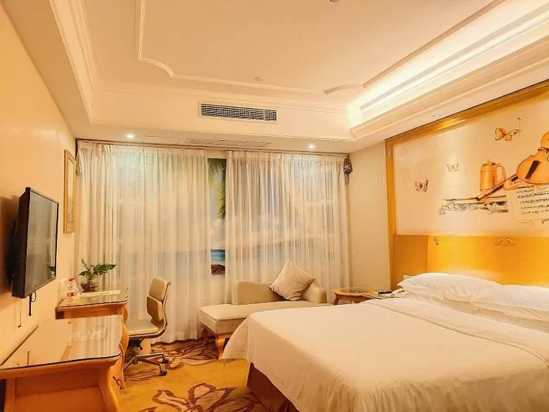 Bed in Vienna Hotel Foshan Ceramic City