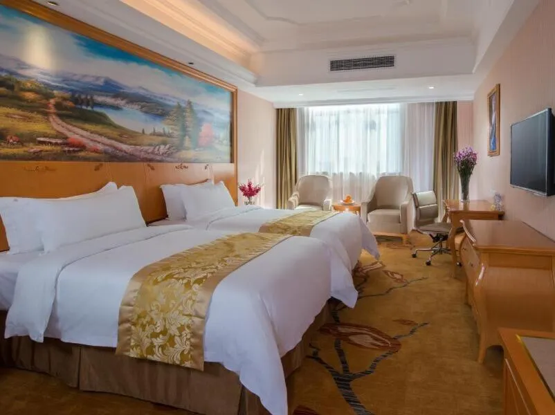 Bed in Vienna Hotel Foshan Ceramic City