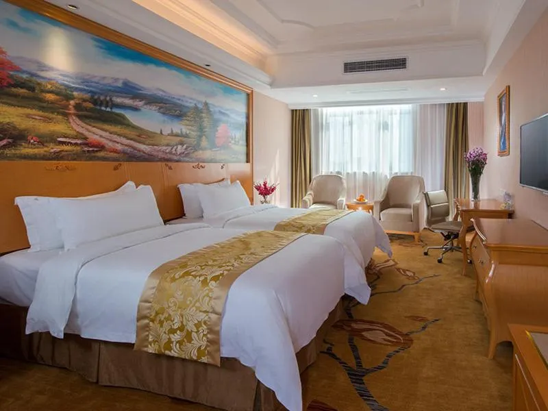 Bed in Vienna Hotel Foshan Ceramic City