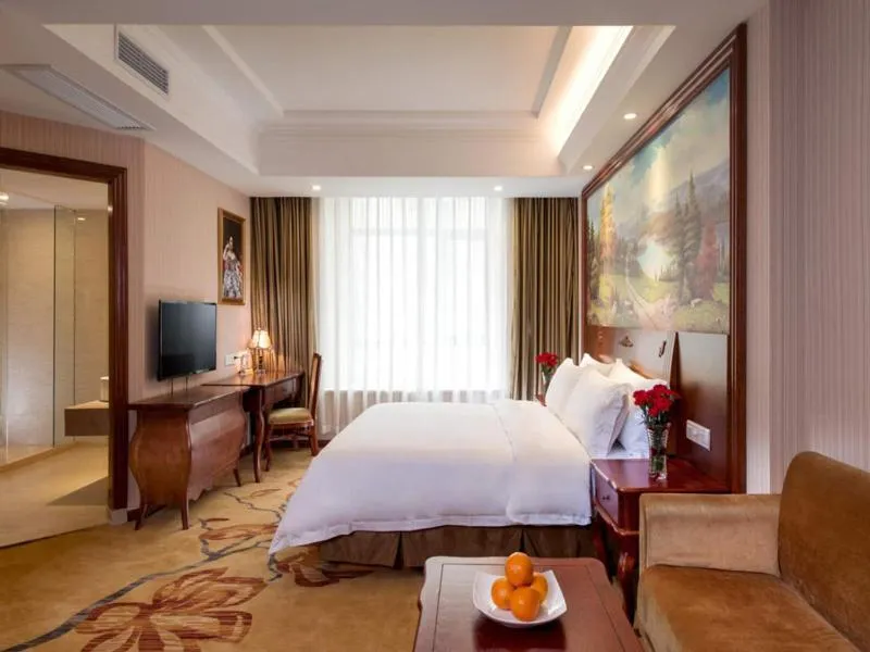 Bed in Vienna Hotel Puning South Huancheng Road High-Speed Train Station