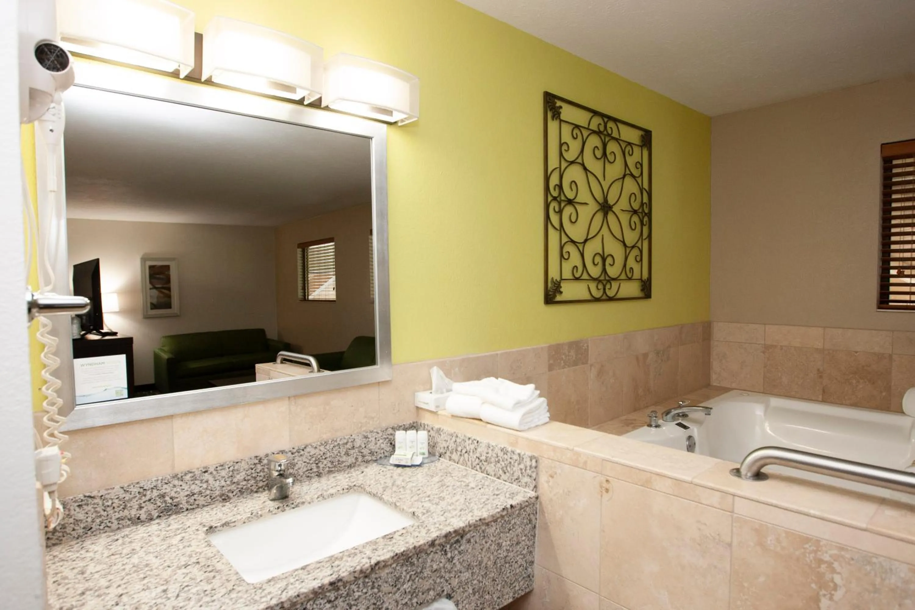 Guests in AmericInn and Suites by Wyndham Delafield-Waukesha-Milwaukee