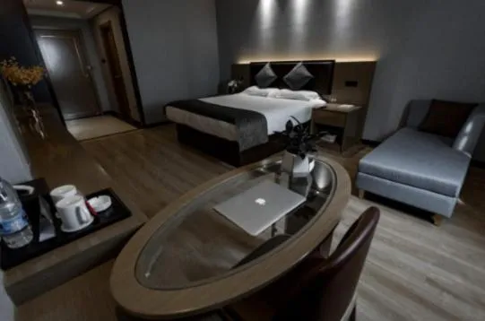 Bed in GreenTree Inn Jiangsu Suzhou Changshu Fuchunjiang International Qipeicheng Road Express Hotel