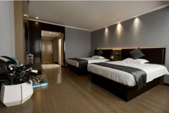 Bed in GreenTree Inn Jiangsu Suzhou Changshu Fuchunjiang International Qipeicheng Road Express Hotel