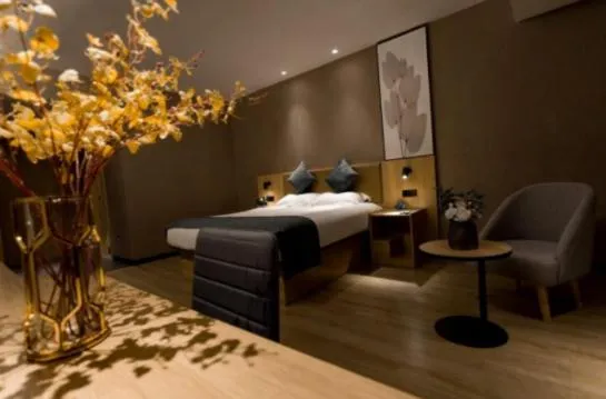 Bed in GreenTree Inn Jiangsu Suzhou Changshu Fuchunjiang International Qipeicheng Road Express Hotel