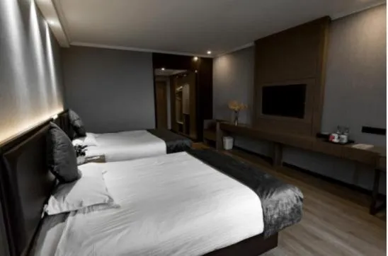 Bed in GreenTree Inn Jiangsu Suzhou Changshu Fuchunjiang International Qipeicheng Road Express Hotel