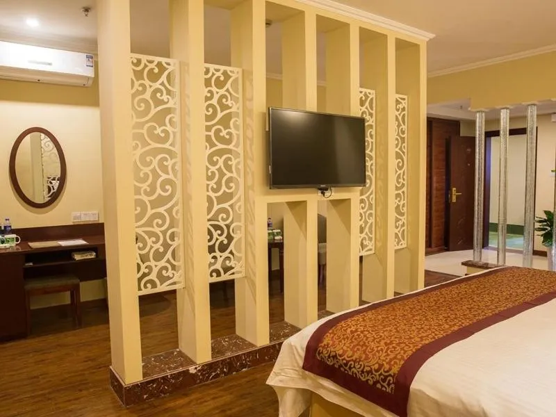 Bed in GreenTree Inn Jiangsu Suzhou Changshu Fuchunjiang International Qipeicheng Road Express Hotel