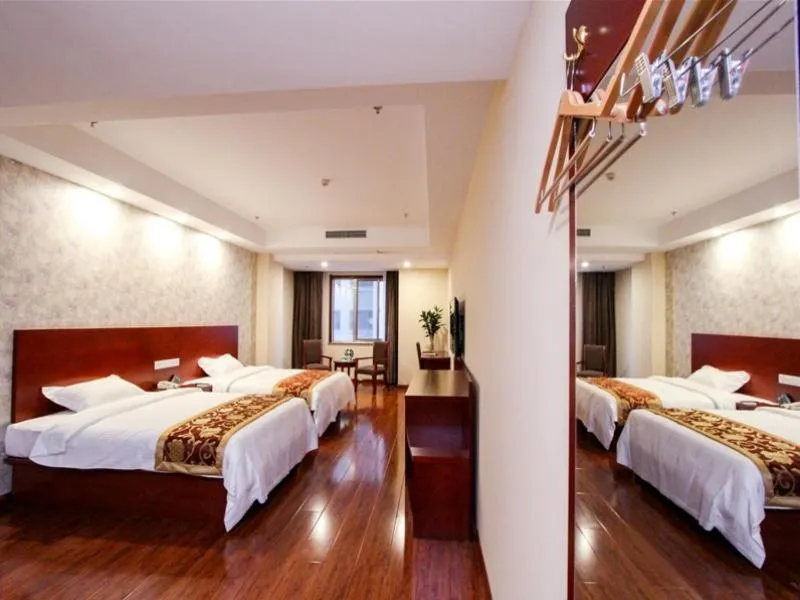 Bed in GreenTree Inn Shandong Zaozhuang Tengzhou East Xueyuan Road Guiheyuan Business Hotel