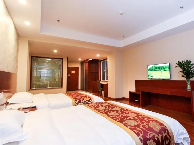Bed in GreenTree Inn Shandong Zaozhuang Tengzhou East Xueyuan Road Guiheyuan Business Hotel