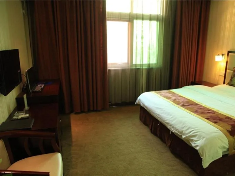 Bed in GreenTree Inn HeNan ZhengZhou Wanda Hanghai Middle Road Business Hotel