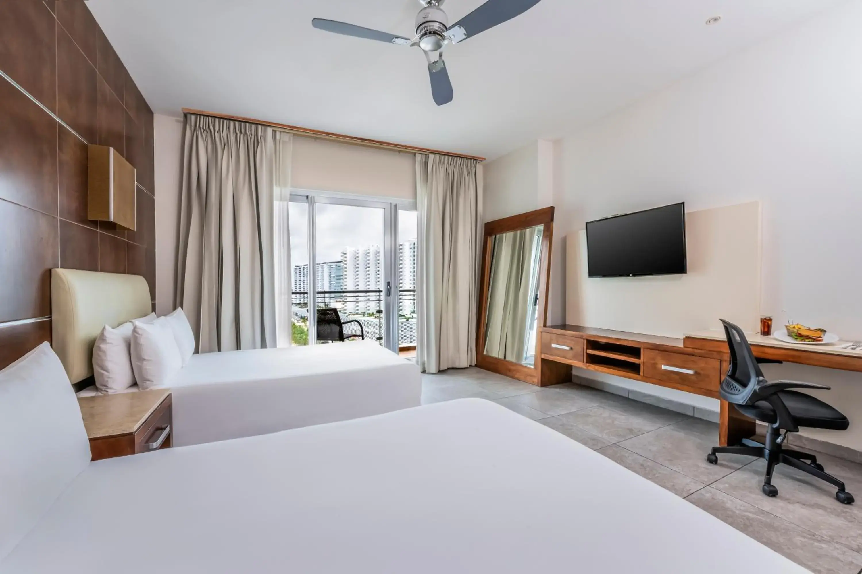 Standard Room w/ Two Double Beds + Beach club access in Krystal Urban Cancun & Beach Club Standard Room w/ Two Double Beds + Beach club access in Krystal Urban Cancun & Beach Club