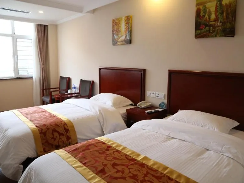 Bed in Greentree Tangshan Nanhu Jindi Business Hotel