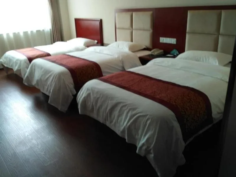 Bed in Greentree Tangshan Nanhu Jindi Business Hotel