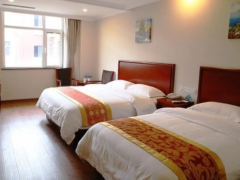 Bed in Greentree Tangshan Nanhu Jindi Business Hotel