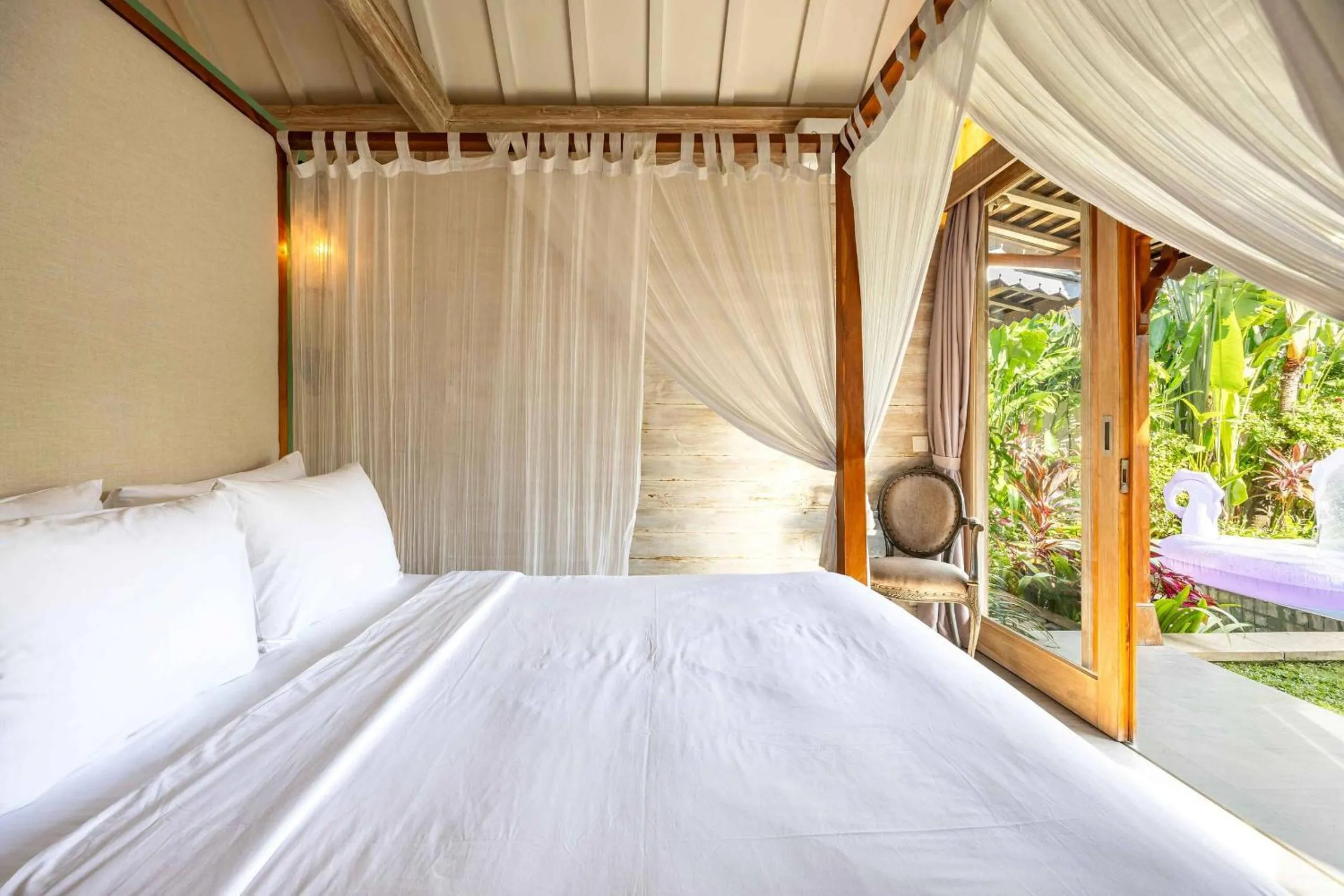 Bed in Villa Du Bah - Cozy Tropical 3BR Villa 12min To Beach