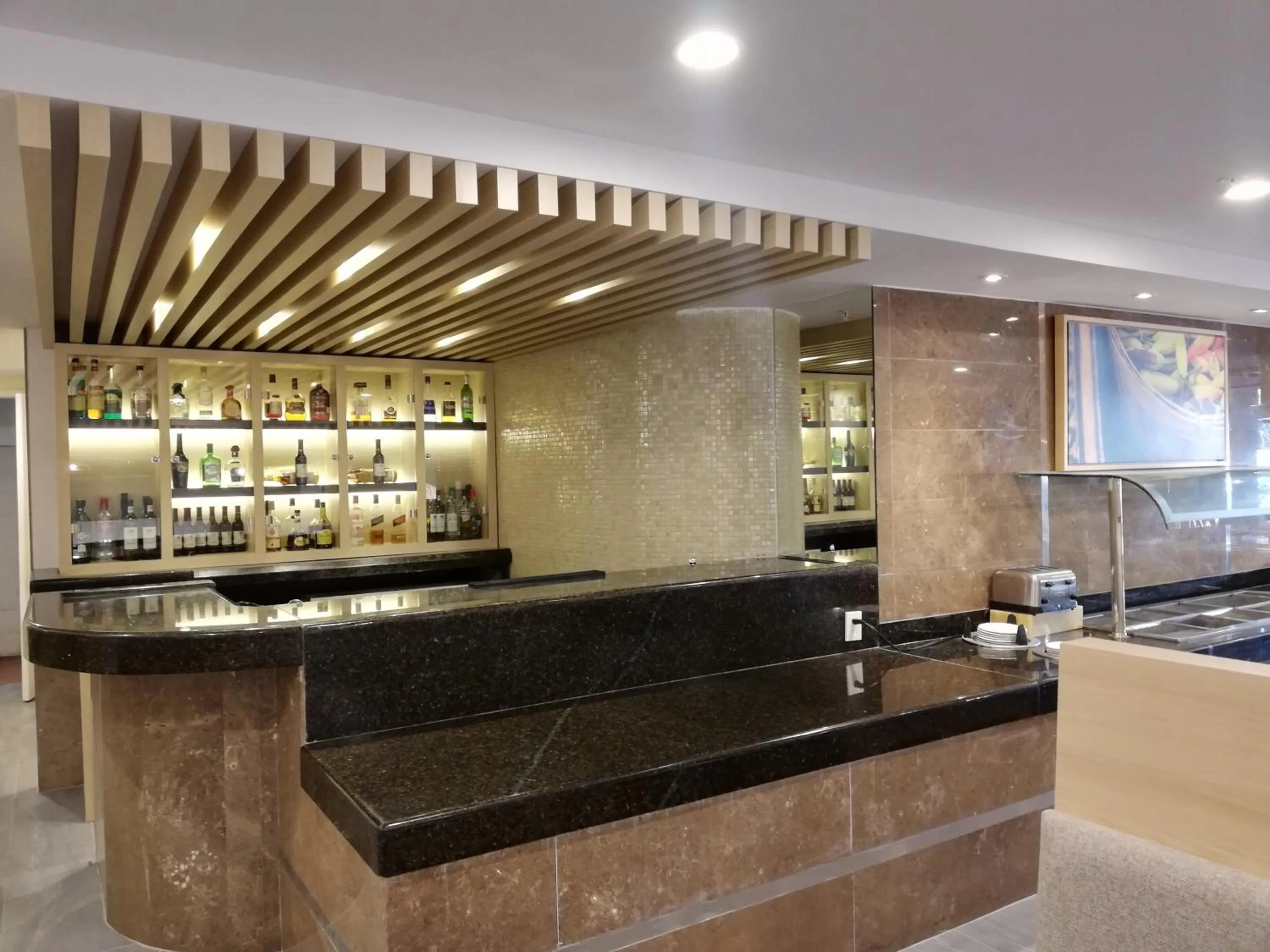Lounge or bar in Holiday Inn Hotel & Suites Centro Historico by IHG