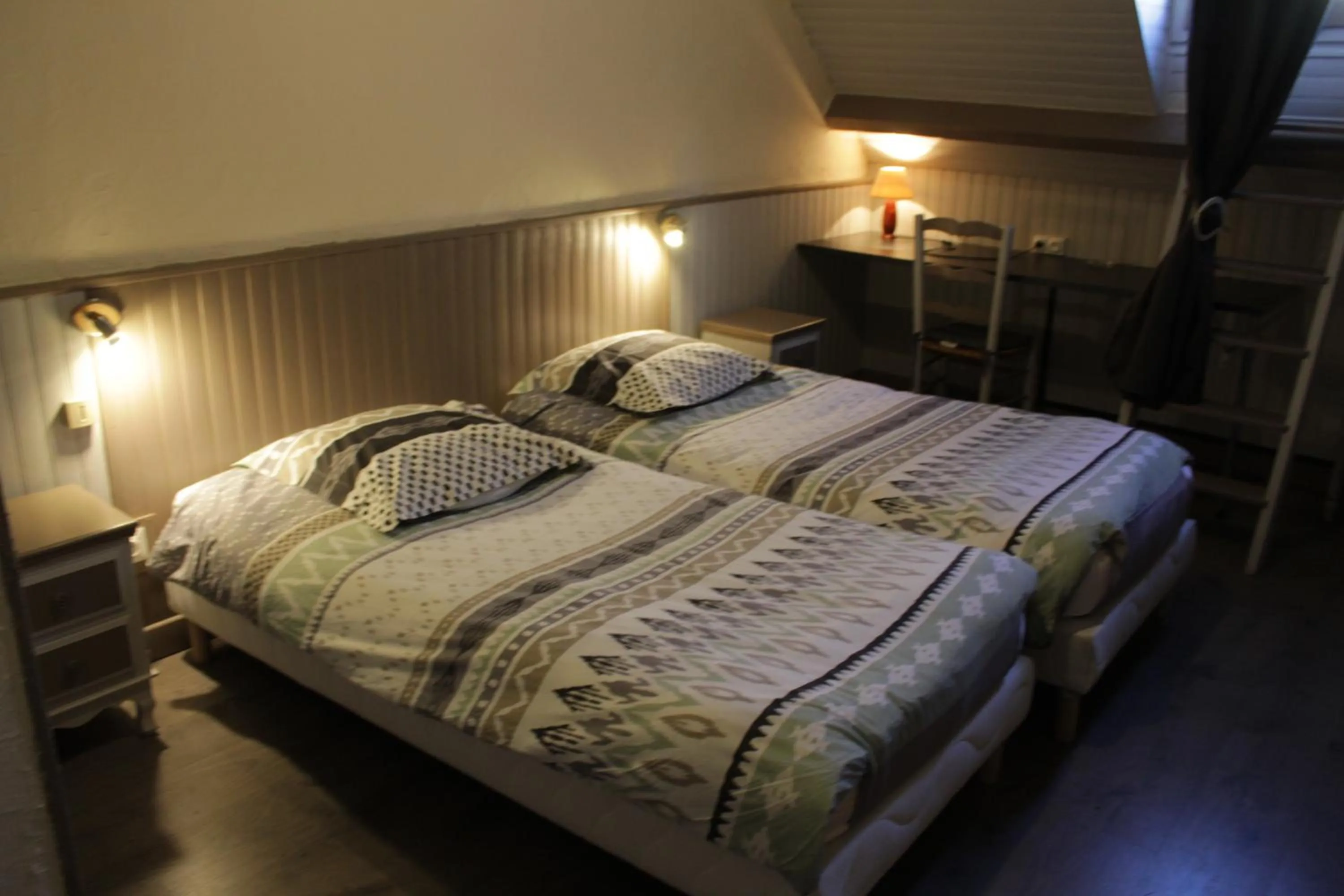 Bed in Hotel Valérie