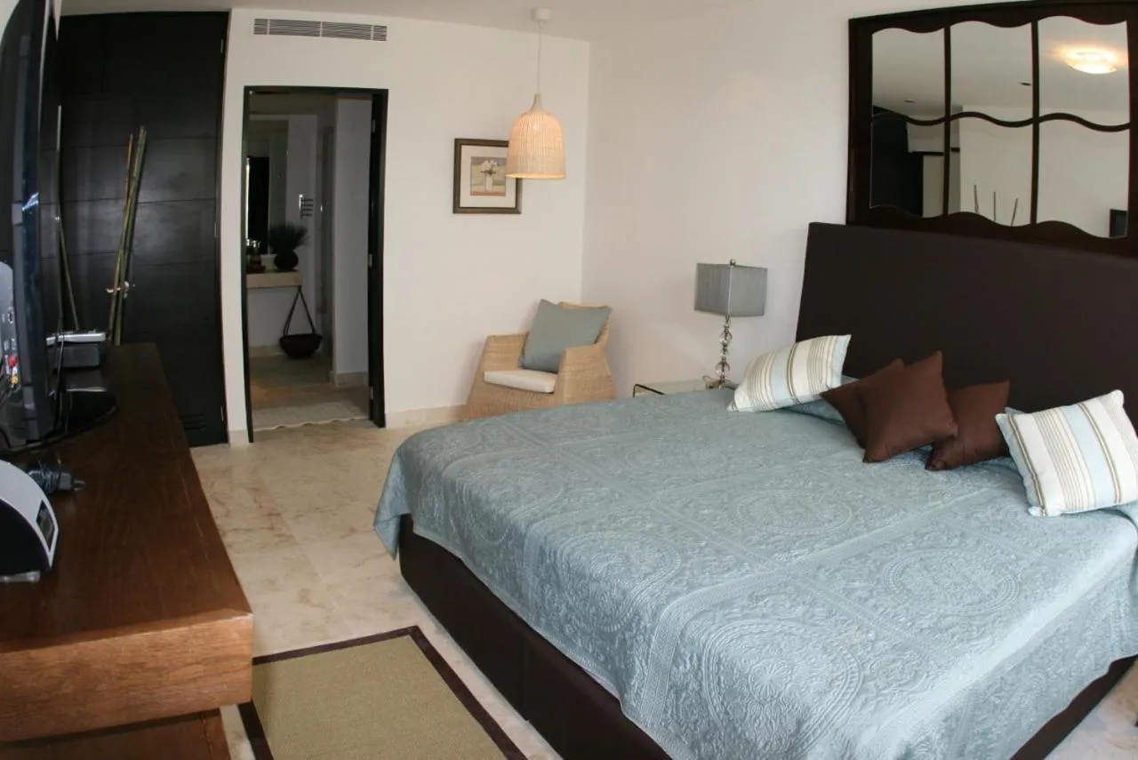 Bedroom, Bed in The Elements Oceanfront & Beachside Condo Hotel