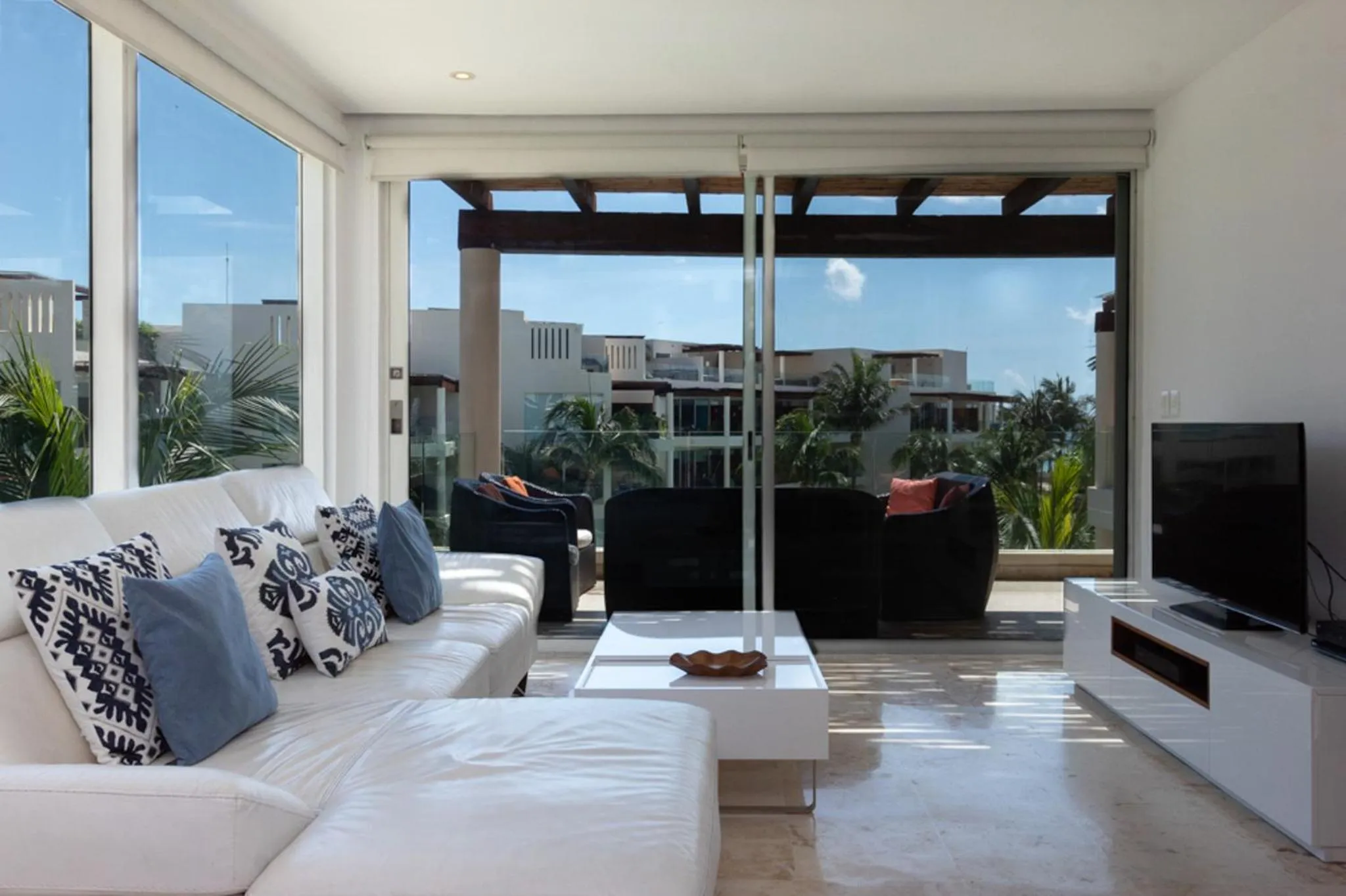 Living room in The Elements Oceanfront & Beachside Condo Hotel