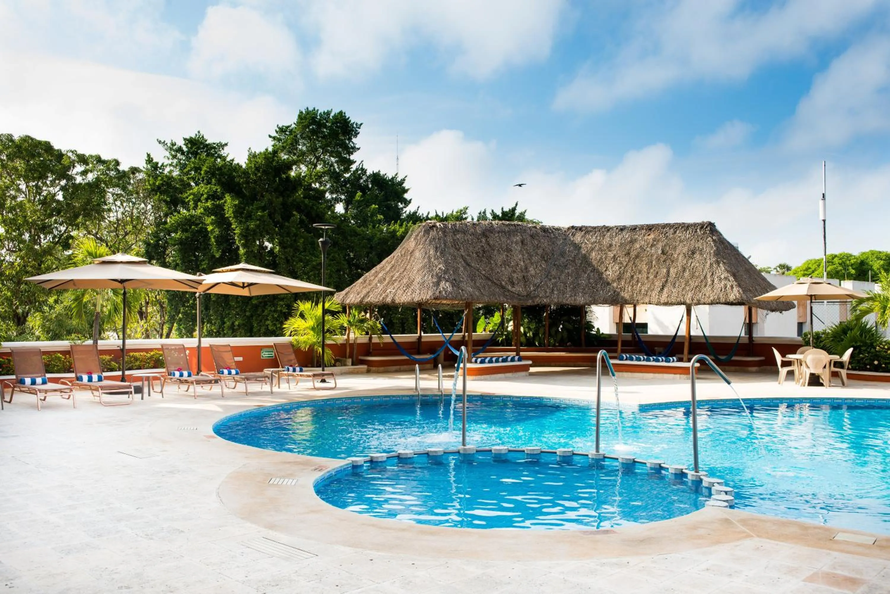 Swimming pool in Holiday Inn Merida by IHG