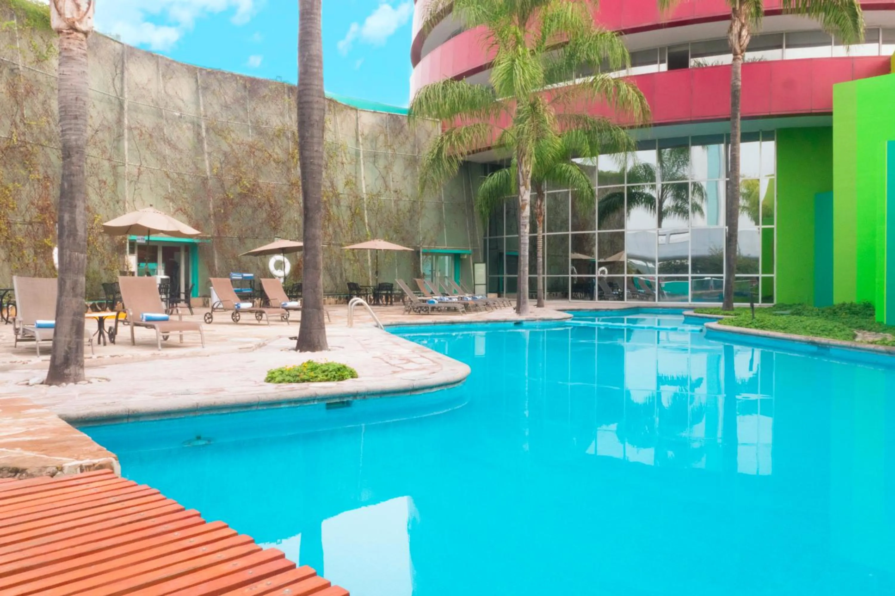 Swimming pool in Holiday Inn Monterrey-Parque Fundidora by IHG