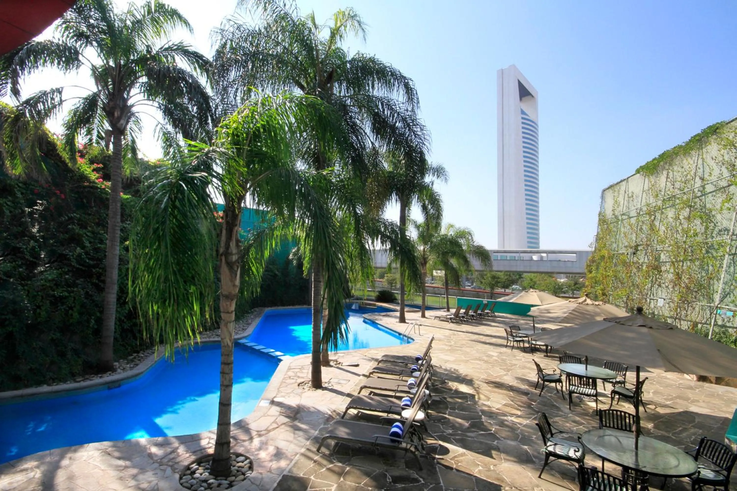 Swimming pool in Holiday Inn Monterrey-Parque Fundidora by IHG