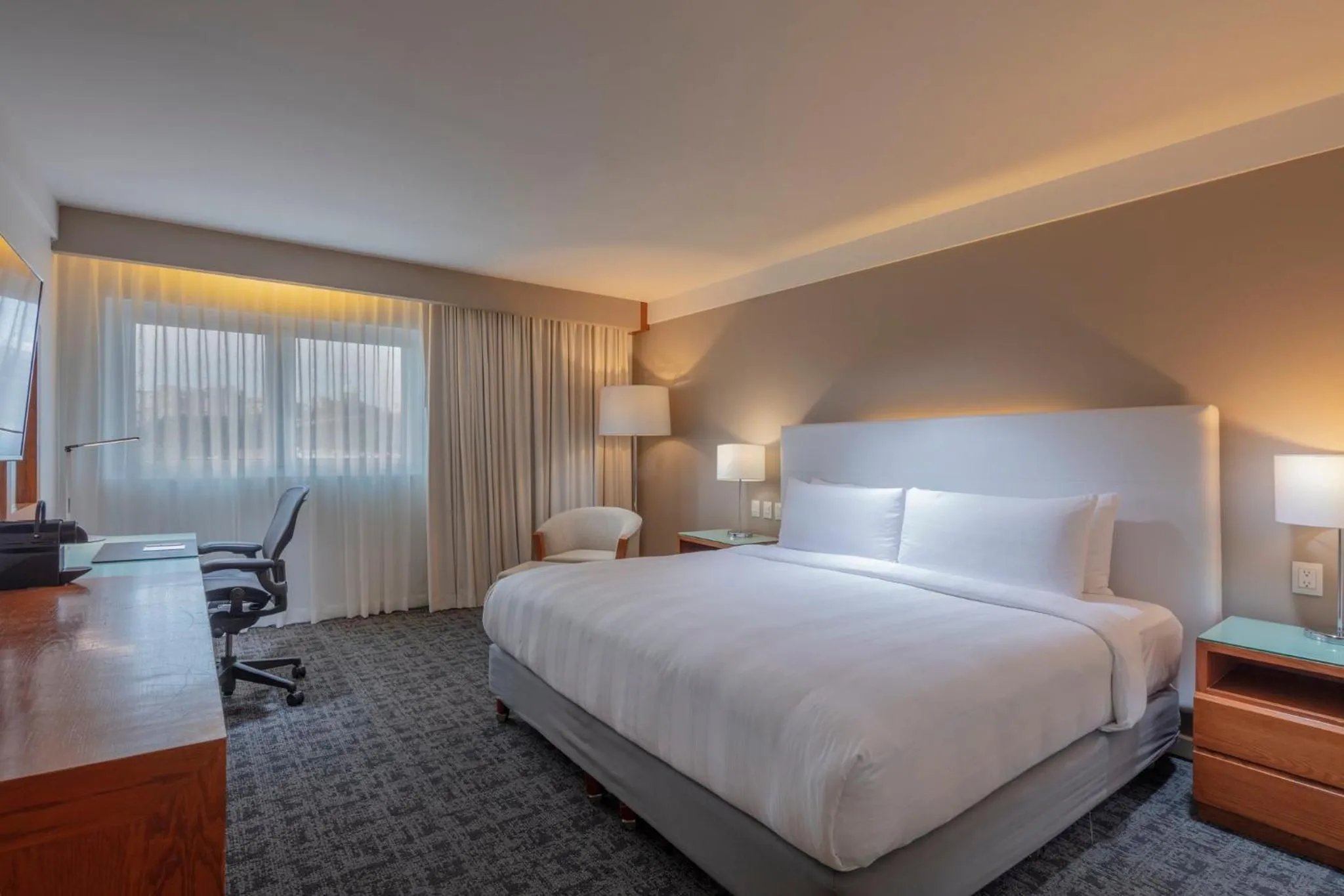 Photo of the whole room, Bed in Presidente InterContinental Puebla by IHG