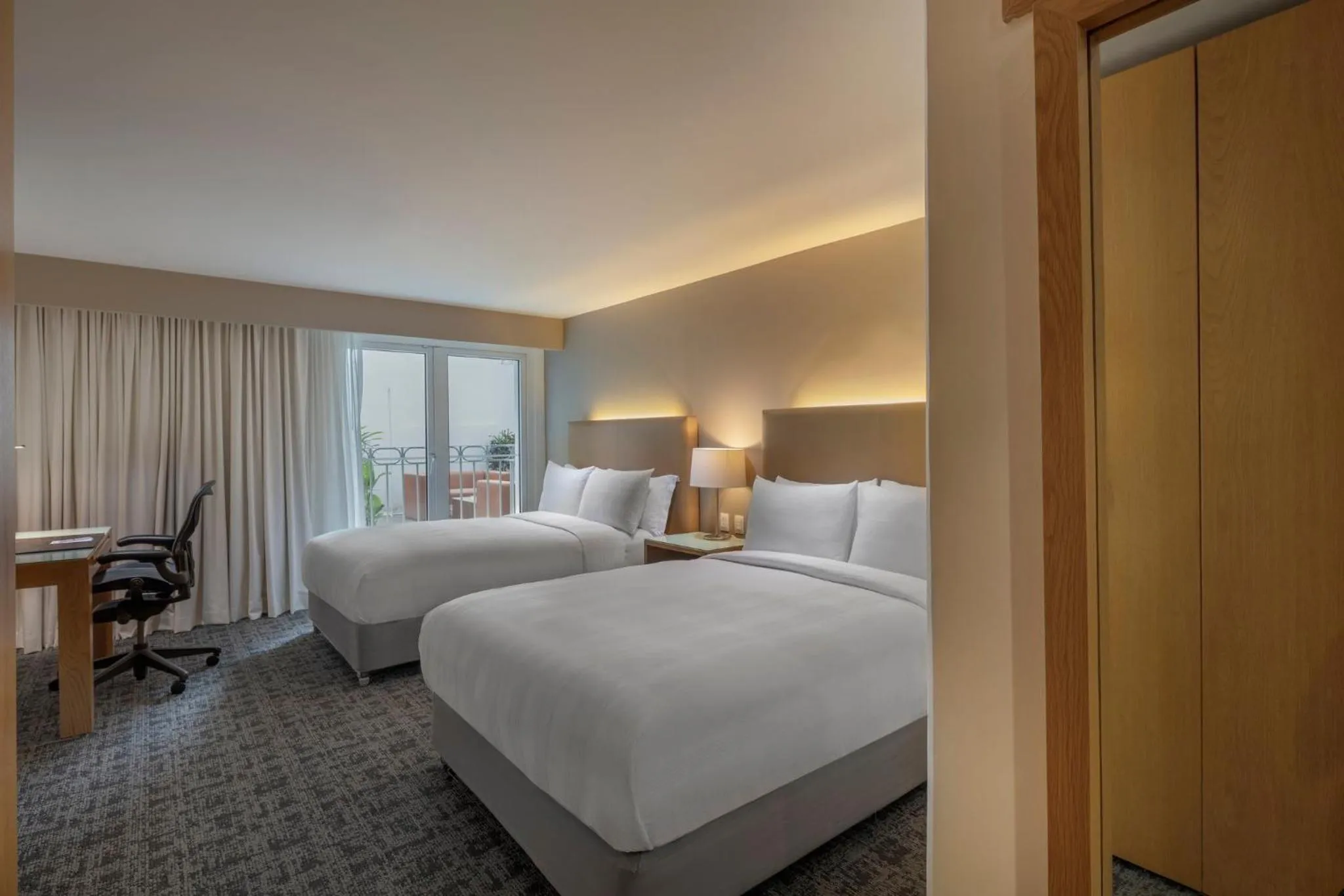 Photo of the whole room, Bed in Presidente InterContinental Puebla by IHG