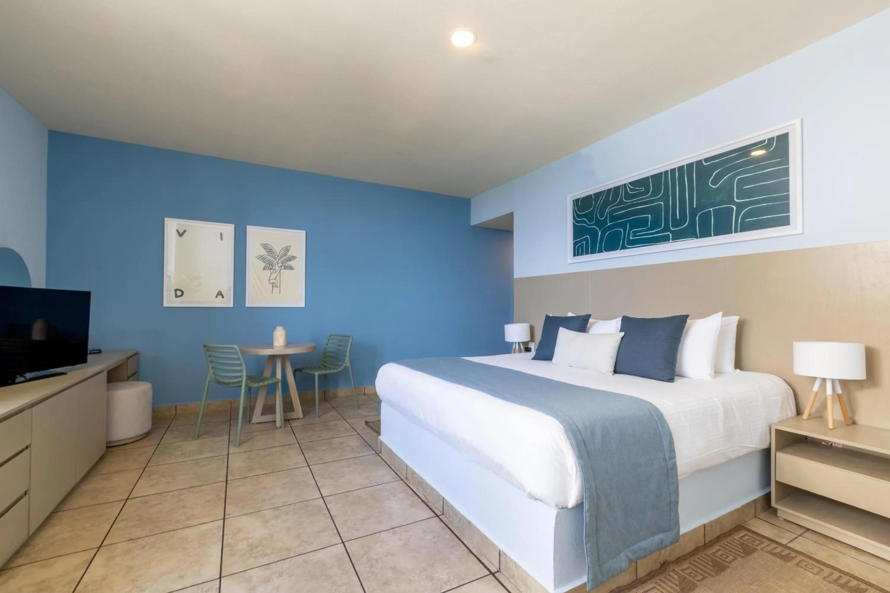 Bed in Ixchel Beach Hotel