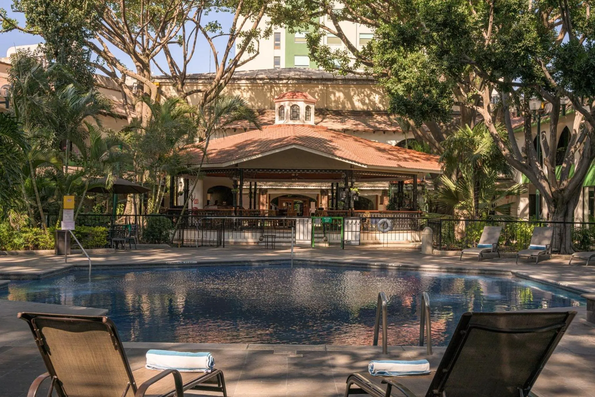 Swimming pool in Holiday Inn Guadalajara Expo Plaza del Sol by IHG