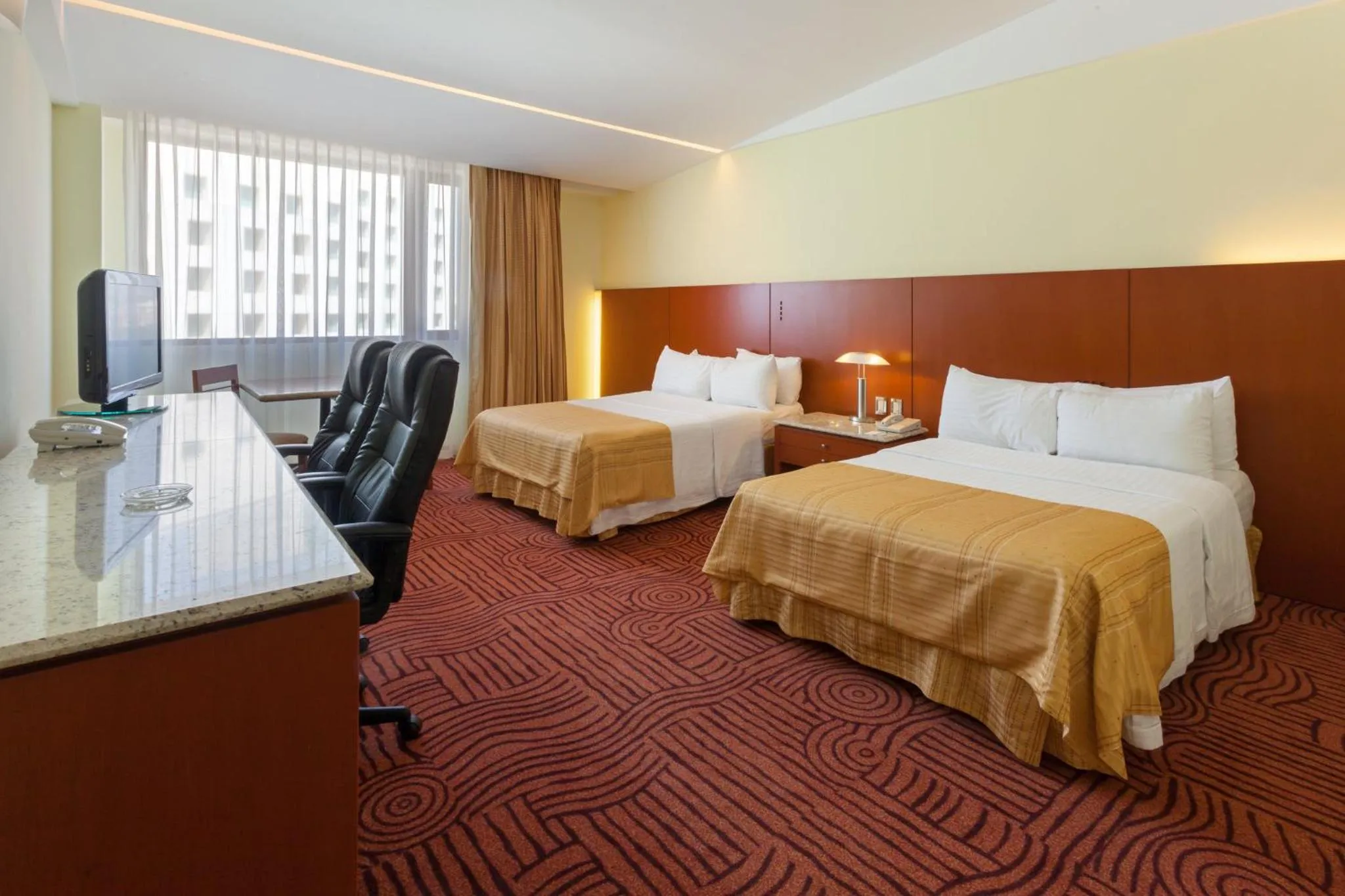 Photo of the whole room, Bed in Holiday Inn Puebla Finsa by IHG