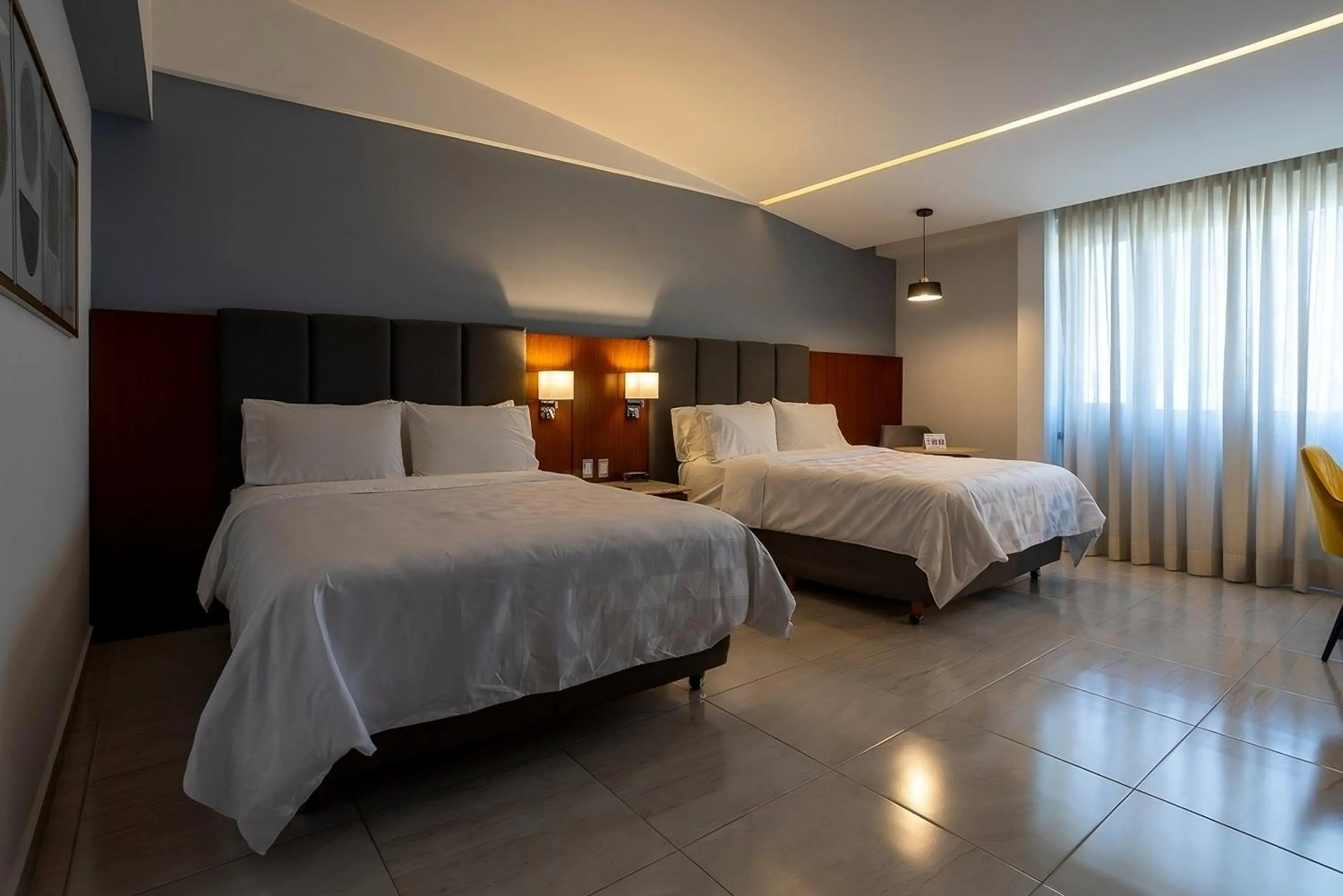 Photo of the whole room, Bed in Holiday Inn Puebla Finsa by IHG