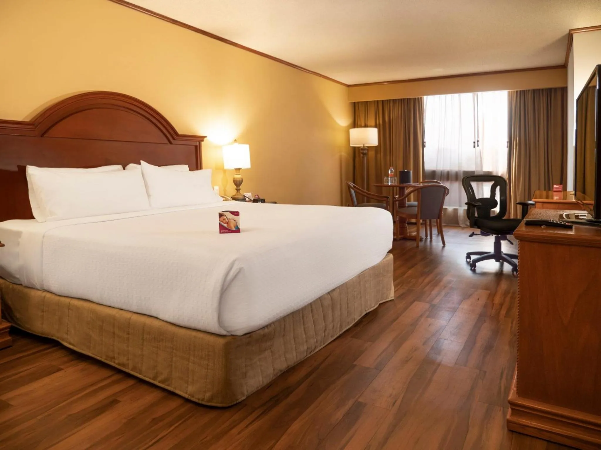 Photo of the whole room, Bed in Crowne Plaza Hotel Monterrey by IHG