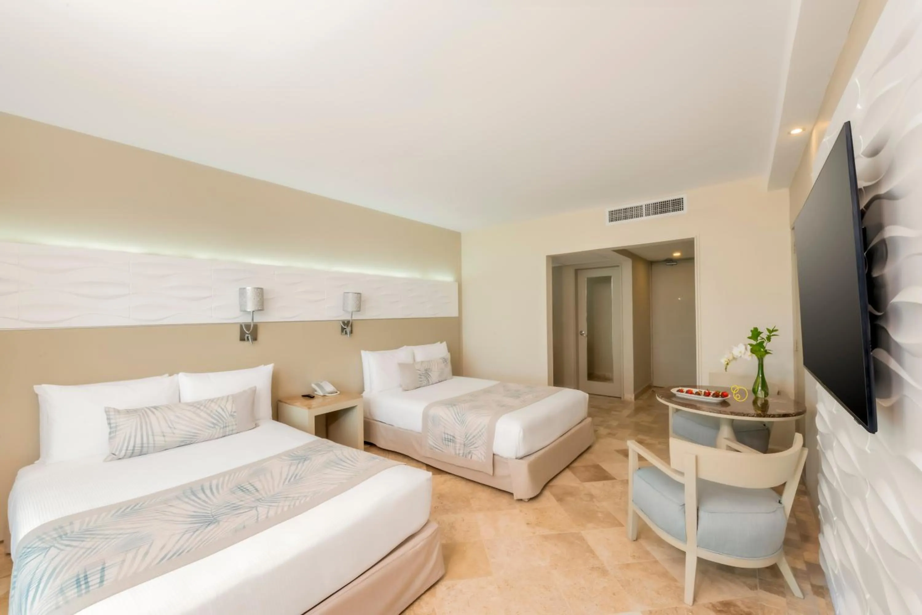 Bed in Krystal Grand Cancun All Inclusive