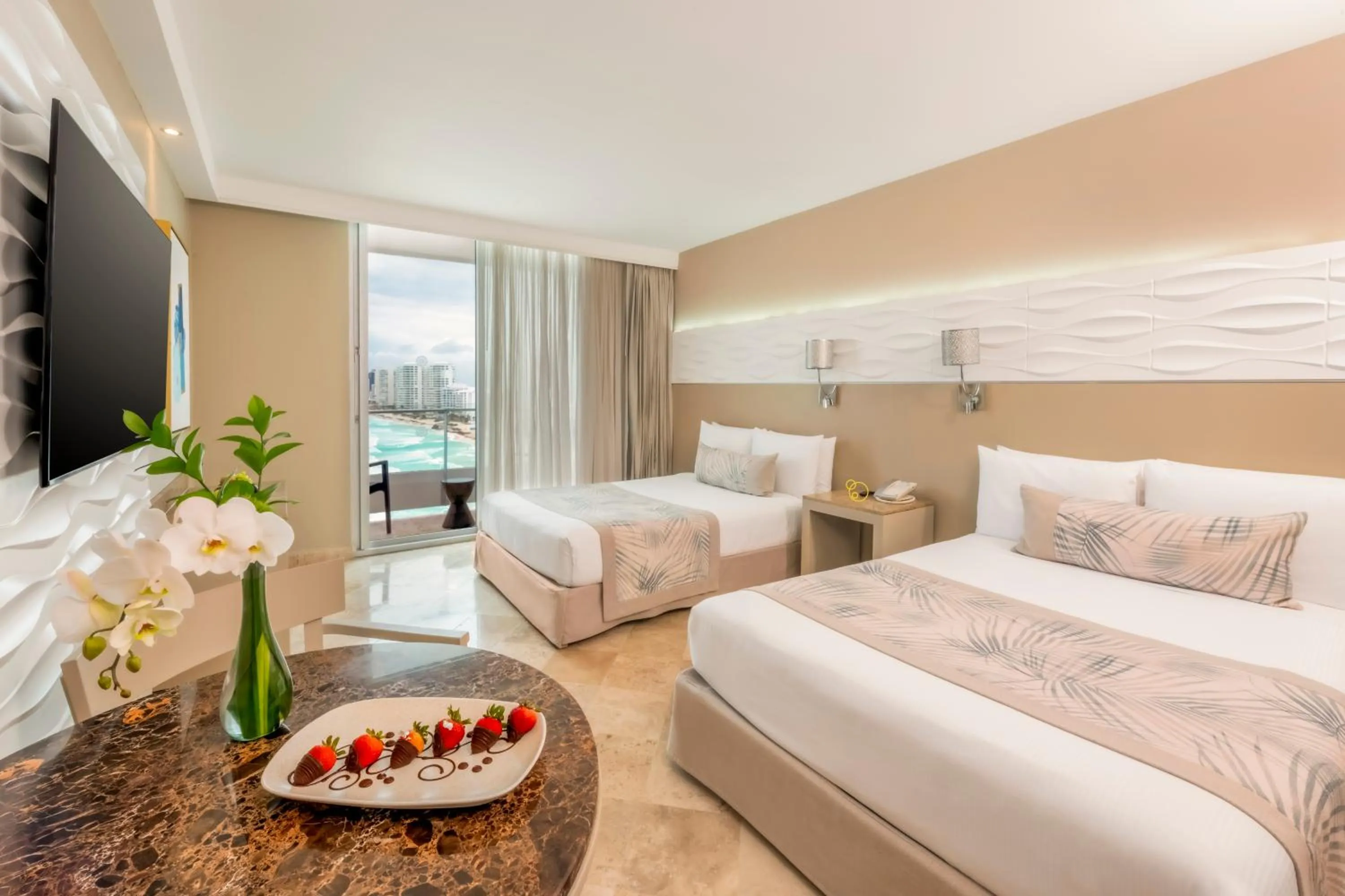 Bed in Krystal Grand Cancun All Inclusive