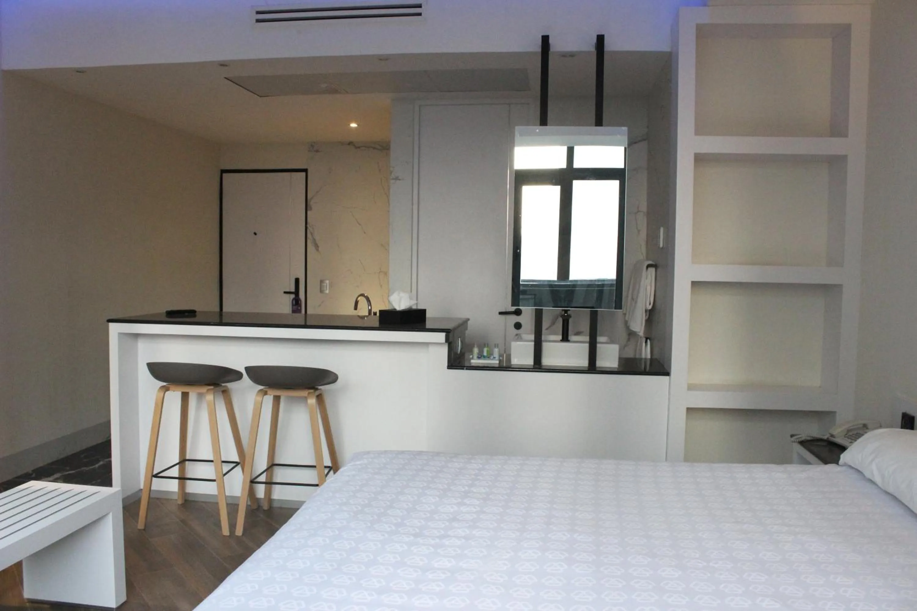 Bed in WeEnjoy Hotels Grand Prix Aeropuerto CDMX