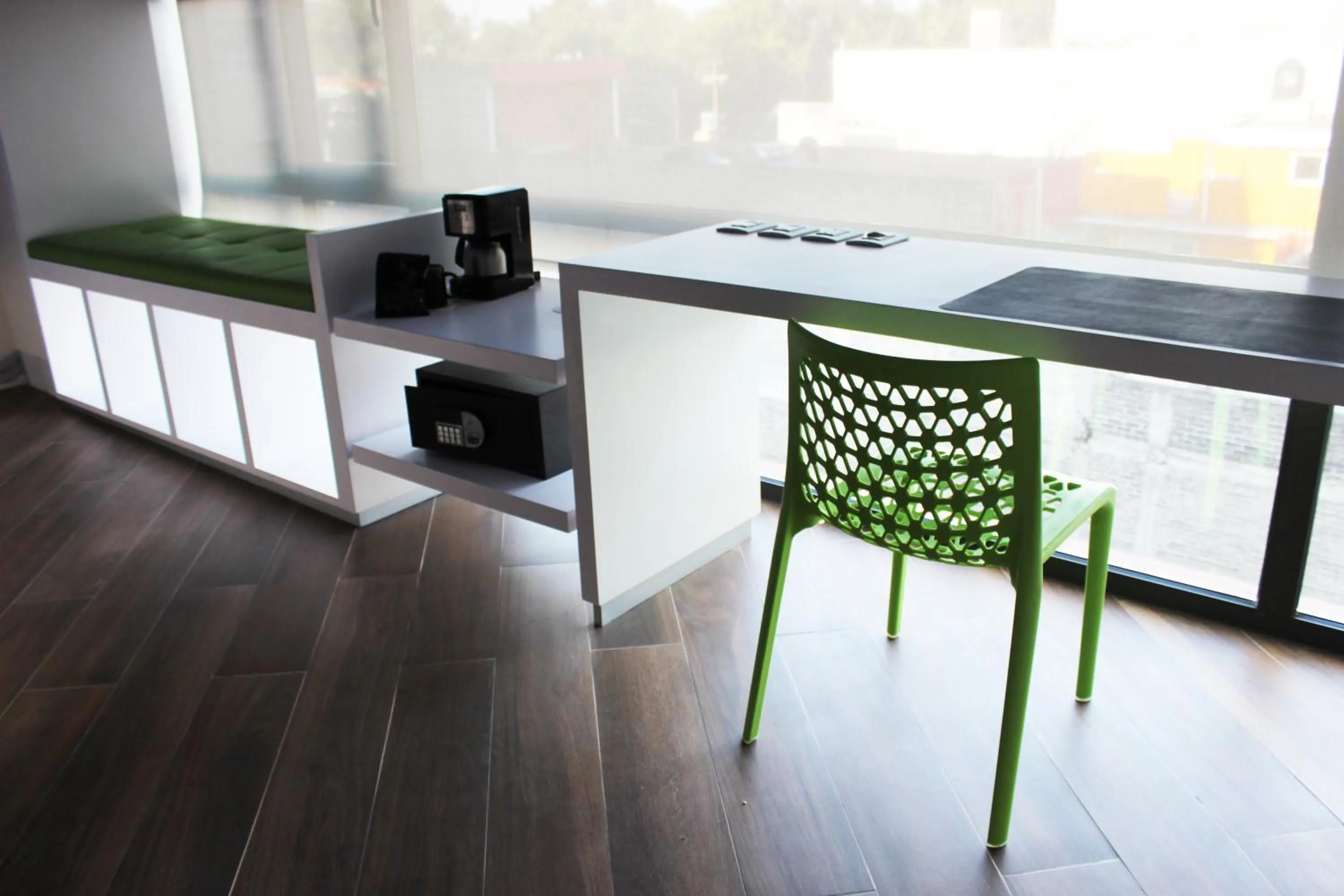 Seating area in WeEnjoy Hotels Grand Prix Aeropuerto CDMX